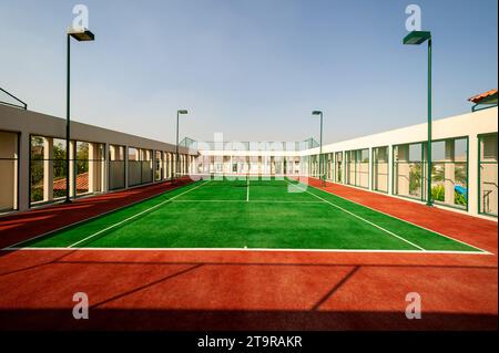 Bangkok, Thailand - January 12, 2007: Rooftop tennis court located at Crystal Park in Bangkok, Thailand. Stock Photo