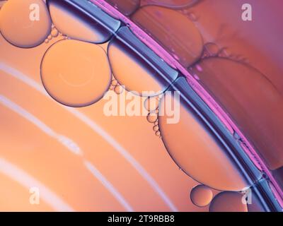 pastel artistic of oil drop floating on the water. Pastel color bubble for background. Abstract oil bubbles background. Macro shot. oil bubbles close Stock Photo