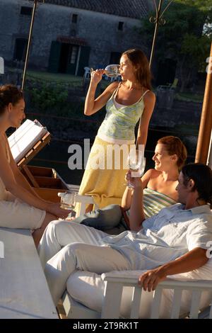 Friends having drinks in Carmelo, Uruguay. Stock Photo