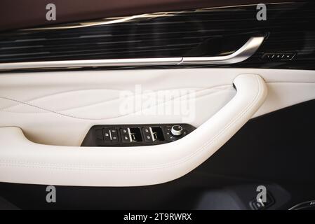 adjusting the lowering of car windows. High quality photo Stock Photo