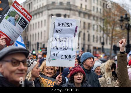 London, UK. 26th Nov, 2023. Pro-Israeli protesters at the 'March Against Antisemitism' hold flags and placards in support of hostages taken by Hamas in Gaza. Credit: Andy Soloman/Alamy Live News Stock Photo