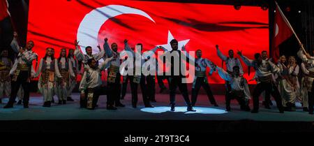 November 23, 2023: Gaziantep, Turkiye, 23 November 2023. Traditional folkloric dancing is performed during the official opening of the â€œSecond Gazi Gamesâ€ in the southern Turkish city of Gaziantep. The ceremony was attended by the Turkish Minister of Youths and Sports Osman AÅŸkÄ±n Bak, in addition to local politicians and dignitaries. The Gazi Games have been organized in coordination with the Gaziantep Governorate and the Greater Gaziantep Municipality, as well as with the Directorate of Youth and Sports and the Directorate of National Education of the governorate (Credit Image: © Muhamm Stock Photo