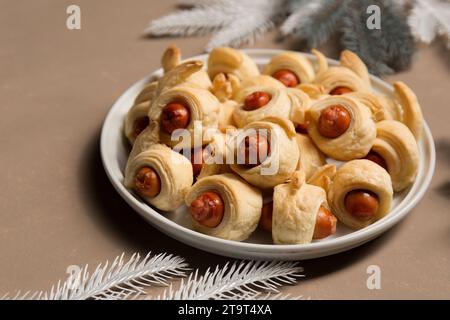 Pigs in a blanket, traditional festive Christmas food on the table. Stock Photo