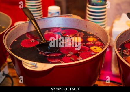 Bowl of hot spicy mulled wine on the Christmas fair Stock Photo