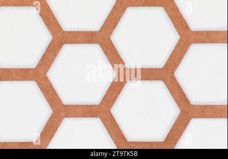 close-up of brown and white hexagon pattern wallpaper background texture Stock Photo