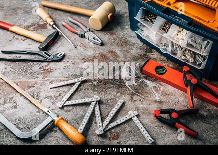 Handyman tool kit with assorted tools, gogles Stock Photo