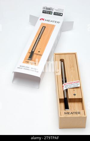 MEATER and Box: App Controlled with Rechargable Battery Wireless Digital Smart Meat Thermometer on a White Background Stock Photo