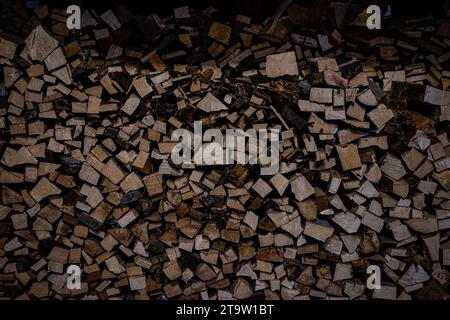 The logs, varying in size, exhibit the rich textures and earthy tones of the timber. Stock Photo