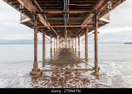 The underside of Paignton Pier on the English Riviera in South Devon. Stock Photo