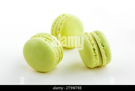 three green cake macaron isolated on white background, maccarone sweet and colorful dessert Stock Photo