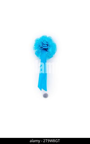 male newborn blue ribbon hanging on the house white door with spyhole background Stock Photo