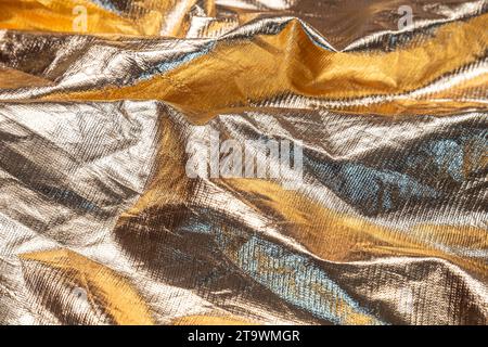 Abstract gold fabric background texture Stock Photo