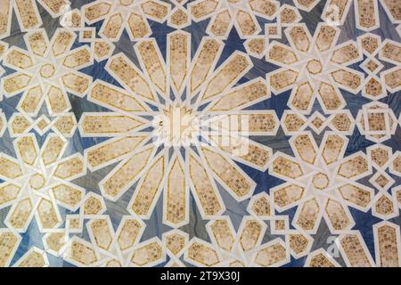 Arabic style, granite and marble floor mosaic with star and floral geometric motifs and patterns in UAE Presidential Palace Qasr Al Watan in Abu Dhabi Stock Photo