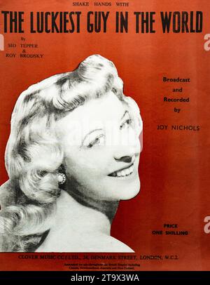 Vintage 1940s sheet music cover for the song 'The Luckiest Guy in the World' by Sid Tepper and Roy Brodsky, featuring a photograph of Joy Nichols, with the publisher Clover Music Co. Ltd. from London.image only. Stock Photo