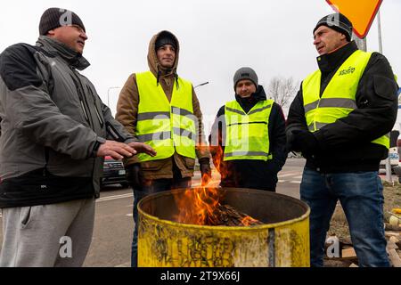 Polish farmers strike as they block truck transport in Medyka - border crossing between Poland and Ukraine, on November 27, 2023 The Union demands renegotiation of transport deals between Ukraine and the European Union. Medyka is the fourth strike sites. Protesters allow only 4 commertial trucks per an hour, that excludes humanitarian and military aid and fuel and food. The strike started on the November 6. Ukrainian truck drivers say they wait in the queue more than 10 days. Stock Photo