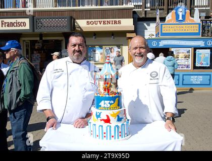 San Francisco, CA - Sept 28, 2023: Bakers at Pier 39 transporting the celebration cake for the event. Stock Photo