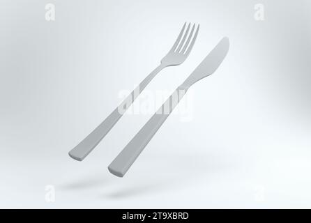 Gray Fork and Knife on a White Studio Background. Minimal concept. Perspective view. Monochrome. 3D render. Stock Photo