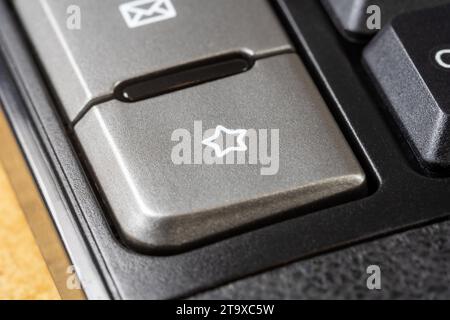 A simple star symbol icon button, favorite bookmark key, liking, adding to favorites, bookmarking a webpage business website SEO rating, rating produc Stock Photo