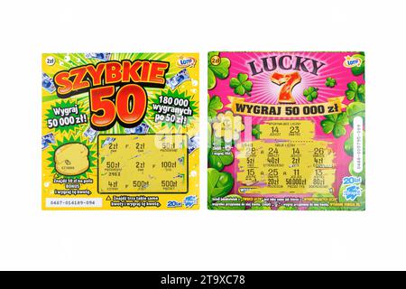 Two scratch off Polish lottery tickets. Gambling, winning money, two lottery paper coupons, tickets, scratchies, scratch cards isolated on white, cut Stock Photo