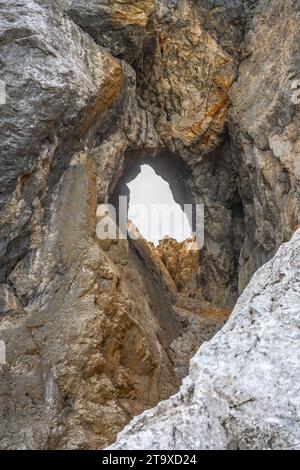 Prisojnik or Prisank Window. The larges rock window in Alps, Triglav National Park, Julian Alps, Slovenia Stock Photo