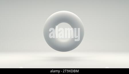 White Torus on a Gray Studio Background. Minimal concept. Monochrome. 3D render. Stock Photo