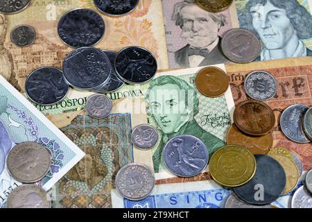 Old money currency of banknotes and coins from different countries of the world, world economy during different times concept, inflation, vintage retr Stock Photo