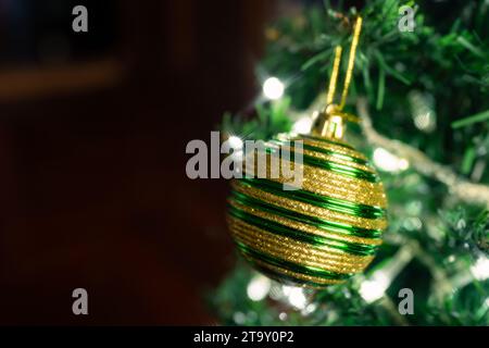 Christmas tree with bauble decorations and lights background Stock Photo