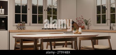 Empty space on a dining table in a minimal Scandinavian kitchen with kitchen appliances. 3d render, 3d illustration Stock Photo