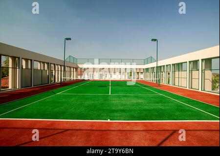 Bangkok, Thailand - January 12, 2007: Rooftop tennis court located at Crystal Park in Bangkok, Thailand. Stock Photo