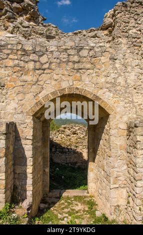 A doorway in the historic 15th century Ostrovica Castle overlooking Kulen Vakuf village in the Una National Park. Una-Sana Canton, Bosnia Stock Photo