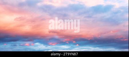 Texture of bright evening pink blue sky during sunset Stock Photo