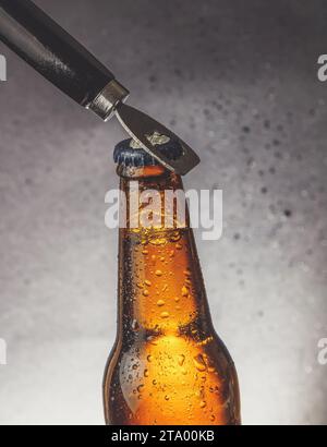 Close Up Of A Golden Bottle Opener On White Background Stock Photo - Alamy