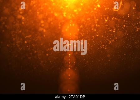 abstract golden light flare leaks with gold particles bokeh Stock Photo