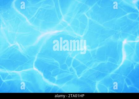 swimming pool bottom caustics ripple like sea water and flow with waves background Stock Photo