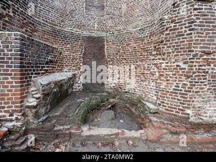 Duisburg, Germany. 28th Nov, 2023. View of part of the oldest surviving post-Roman city wall in Germany. Extensive sections of around one kilometer of Duisburg's medieval city wall have survived and have been restored in sections for almost 20 years now. Built between the 12th and 14th centuries, the defensive wall was hidden for years between industrial buildings in Duisburg harbor. Credit: Roland Weihrauch/dpa/Alamy Live News Stock Photo