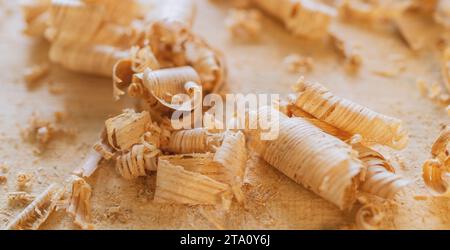 Wood working wood shavings in variety of sizes on a table Stock Photo