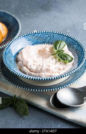 Taramosalata Greek spread Paste (pate) made of ground fish, shrimps, and caviar, served with lemon. Fish Egg Paste Tarama (white and rose), popular Is Stock Photo