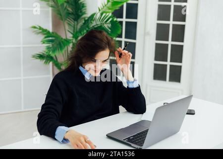 Woman in Chatting In Office Computer Desk Online Job Stock Photo