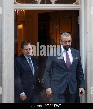 Downing Street, London, UK. 28th Nov, 2023. James Cleverly MP, Secretary of State for the Home Department, Home Secretary leaving 10 Downing Street after weekly cabinet meeting, behind him is Robert Jenrick MP, Minister of State, Home Office (Immigration). Credit: Malcolm Park/Alamy Live News Stock Photo