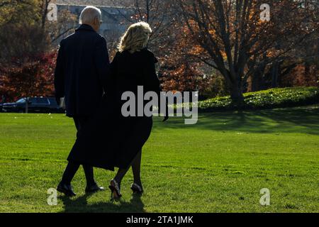 Washington, United States. 28th Nov, 2023. President Joe Biden and First Lady Jill Biden walk across the South Lawn towards Marine One at the White House on November 28, 2023 in Washington, DC The President and First Lady are traveling to Atlanta, Georgia, to attend a memorial service for former First Lady Rosalynn Carter. (Photo by Samuel Corum/Sipa USA) Credit: Sipa USA/Alamy Live News Stock Photo