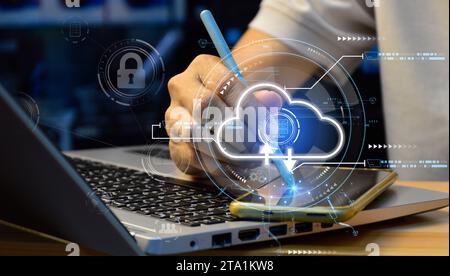 Man using laptop and smartphone with cloud computing diagram cloud technology Data storage Concept of network and internet services Stock Photo