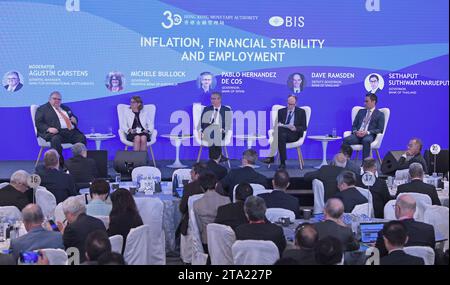 Hong Kong, China. 28th Nov, 2023. Guests attend the panel discussion of a high-level conference co-organized by the Hong Kong Monetary Authority (HKMA) and the Bank for International Settlements (BIS) in Hong Kong, south China, Nov. 28, 2023. TO GO WITH 'High-level conference in Hong Kong highlights challenges to central banks' Credit: Chen Duo/Xinhua/Alamy Live News Stock Photo