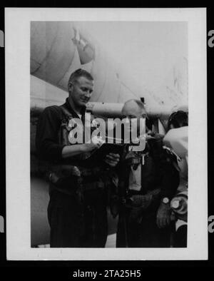 World War II veteran and former Marine Corps pilot Gregory 'Pappy' Boyington visits his old squadron during the Vietnam War on May 5, 1971. Boyington, a highly decorated pilot and leader, gained fame as the commander of the famous Black Sheep Squadron. Stock Photo