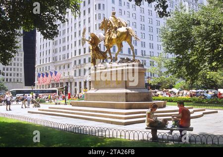 Grand Army Plaza in New York. Gold Statue of William Tecumseh Sherman and Goddess Victory by Augustus Saint Gaudens. New York City landmark USA Stock Photo