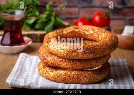 Turkish fast food bagel called Simit. Turkish bagel Simit with sesame. Bagel is traditional Turkish bakery food. Turkish name; simit - gevrek Stock Photo