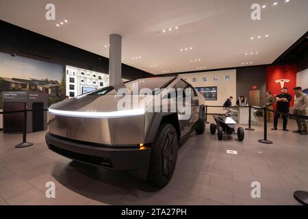 Tesla Cybertruck is displayed together with the Cyberquad for kids at the Tesla showroom in San Jose's Santana Row on Friday, November 24, 2023. Stock Photo