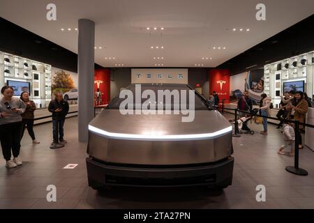 Tesla Cybertruck is displayed together with the Cyberquad for kids at the Tesla showroom in San Jose's Santana Row on Friday, November 24, 2023. Stock Photo