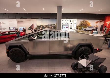 Tesla Cybertruck is displayed together with the Cyberquad for kids at the Tesla showroom in San Jose's Santana Row on Friday, November 24, 2023. Stock Photo