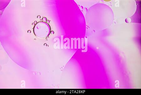 Abstract colorful Background Oil texture in Water surface with Bubbles micro shot close-up. Stock Photo