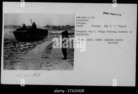 Sergeant G. J. Vojack from the 1st Marine Division Photographic Section ...